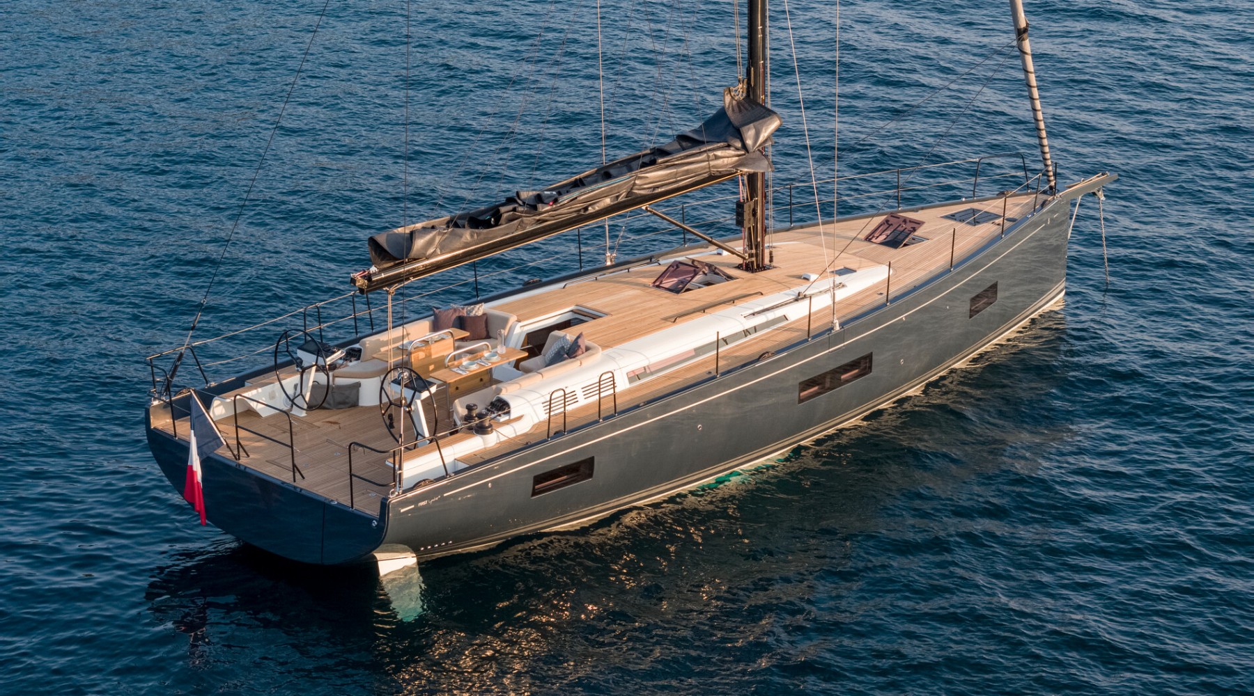 first_yacht_53_foto_catalogo_beneteau_first_yacht_53_09_fondear_puesta_de_sol.JPG
